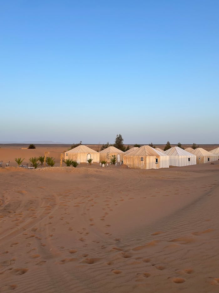Explore the serenity of a luxury desert camp in Morocco's breathtaking Sahara. Perfect travel escape.